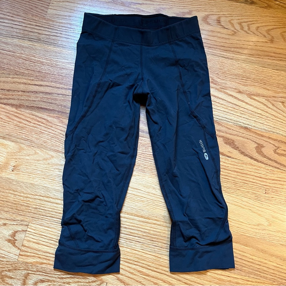 Sugoi black leggings size small
